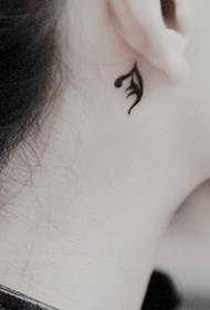 girls ear root black and white alternative small tattoo