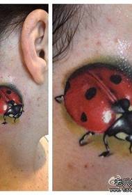 a small, cute seven-star ladybug tattoo pattern on the neck