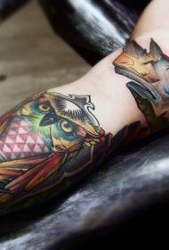 arm color vintage rhinoceros head and owl tattoo