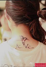 woman neck hummingbird tattoo work