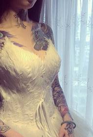beautiful beautiful double flower arm tattoo