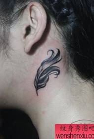 black gray feather tattoo pattern on the girl's neck