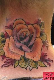 beautiful new school rose tattoo pattern on the neck of the boy