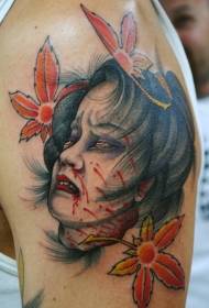 Big arm creepy bloody head with leaf tattoo pattern
