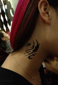 cool totem dragon tattoo at the neck of the niece