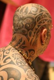 głowa tatuaż czarny bogaty wzór kręconych pasków