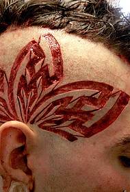 personality male head alternative cut meat tattoo
