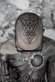 head geometric triangle tattoo pattern