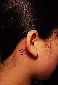 girls simple ear totem tattoo after the ear