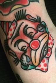 traditional style clown tattoo on calf Picture