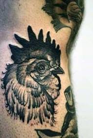 calf black and white cock head tattoo pattern