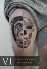 大腿雕刻風格黑色半骷髏半猴子頭紋身圖案
