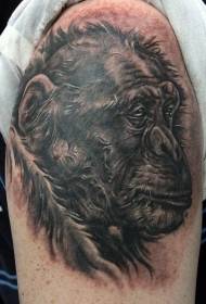 chimpanzee e ntšo hlooho e kholo ea letsoho la tattoo