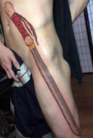 man's side of a domineering sword tattoo picture