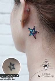 colored five-pointed star tattoo pattern behind the ear