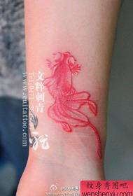 girl's wrist small and beautiful little goldfish tattoo pattern