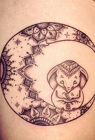 beautiful decorative crescent moon on the thigh and cute elephant tattoo picture