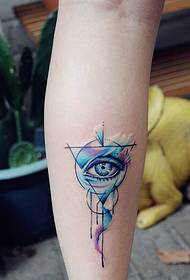 delicate watercolor God eye tattoo pattern on the outside of the calf