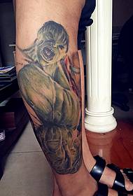 two different styles of leg totem tattoo tattoo