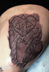 patrón de tatuaje de piedra de dios de la pierna