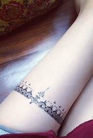 totemo tatuiruotės paveikslėlis veikia gražų šlaunį