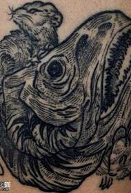 Patrón de tatuaxe de carcasa de dinosauros