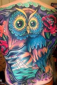 a colorful back owl tattoo pattern