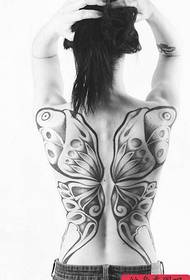 Woman full of butterfly tattoos