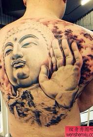 Tatoo-show-ôfbylding oanrikkemandearre in folslein werom Buddha-tatoeëpatroan