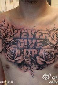 a rose text tattoo on the chest