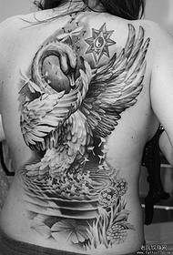 Beautiful woman with back swan tattoo pattern