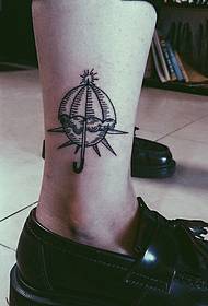 very chic leg small totem tattoo