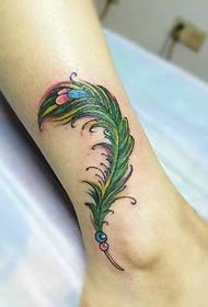 pretty eye-catching leg feather tattoo picture