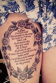 Creative English tattoo surrounded by ten flowers