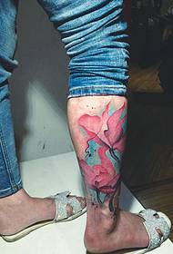 wrapped calf watercolor leaves tattoo tattoo is very personality