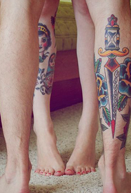 a beautiful tattoo on a couple calf