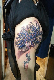 Chest Chrysanthemum tattoo image of the thighs