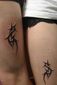 couple thigh on totem tattoo