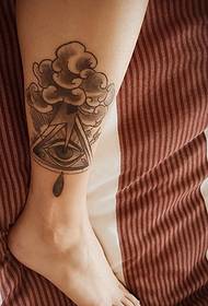 personality and creative bare feet totem tattoo pictures