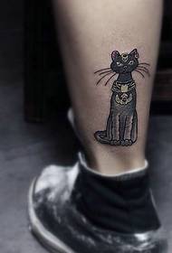 a small night cat tattoo picture in the leg