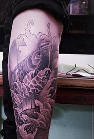 low-key calf black and white squid tattoo