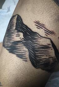 Thigh line mountain tattoo pattern