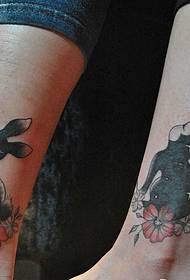 cute animal couple tattoo hidden in the leg image