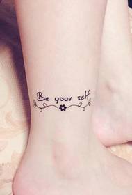 small fresh tattoo on the bare feet elegant and noble