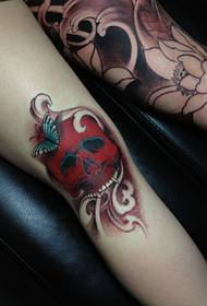 Creative red skull arm tattoo work