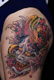 female thigh color prajna tattoo pattern