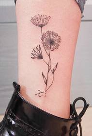 calf black and white flowers Tattoo pictures are very beautiful