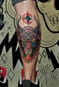Creative horns head totem foot tattoo