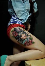 Beautiful cartoon girl pattern tattoo on the thigh