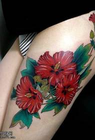 Nice looking flower tattoo pattern on the legs